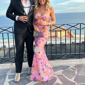 Pink Mac Duggal fitted formal gown with colorful sequin flowers -